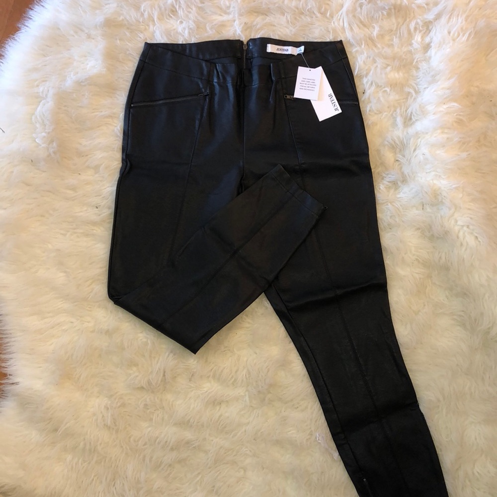 Black leather skinny jeans